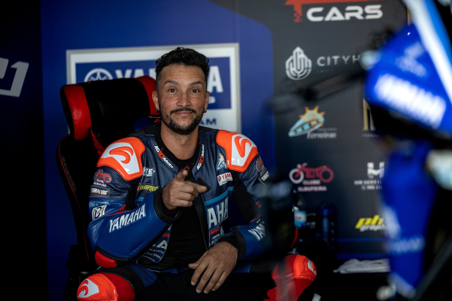 Miguel Romão in racing gear in the paddock